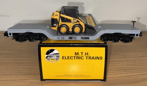 Picture of MTH RailKing Caterpillar Depressed Flatcar w/ Skid Loader (operated)